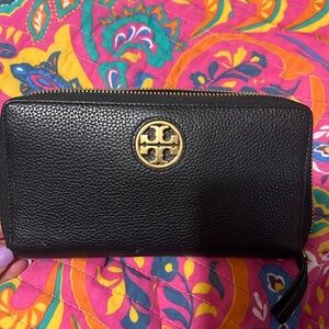 black Tory Burch leather wallet with gold emblem
